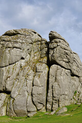 Haytor Rocks, Dartmoor's most famous landmark, is a granite tor on the eastern edge of Dartmoor in Devon, UK. sunny day.