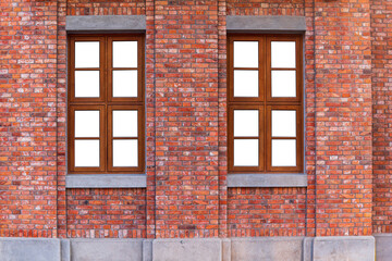 Vintage orange brick wall and wood window with white glass