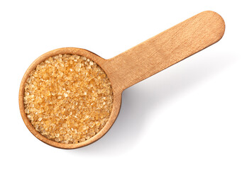 yellow sanding sugar in the wooden measuring spoon, isolated on white, top view