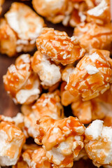 Macro photo of popcorn in caramel. Popcorn background. High quality photo