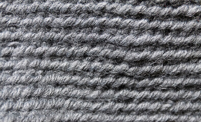 Woolen knitted surface of grey textile