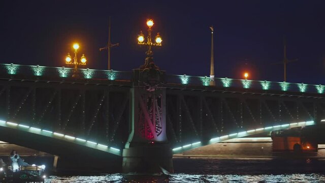 Saint-Petersburg, RUSSIA - May 29 2021, 4k: pleasure craft in Neva river, view Trinity bridge and Peter and Paul fortress, on May 29, 2021 in Saint-Petersburg, Russia