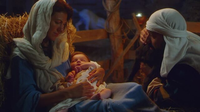Joseph with lamb near Mary and baby Jesus nativity