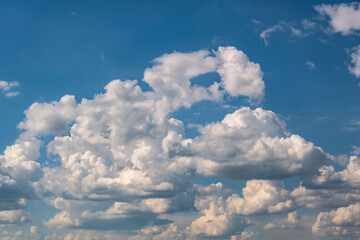 Blue sky background with big white tiny stratus cirrus striped clouds - obrazy, fototapety, plakaty