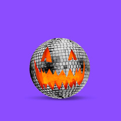 Scary Halloween pumpkin like big disco ball isolated on purple background, the night of fear.