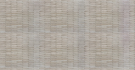 Wall made of thin artificial stone bricks, seamless texture pattern