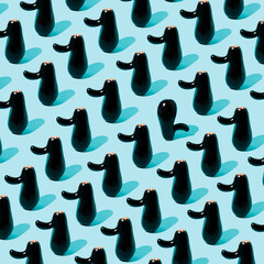 A pattern of unusual eggplant. Like / Dislike Aesthetics on a blue background.