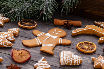 Homemade christmas gingerbread cookies on wooden table.