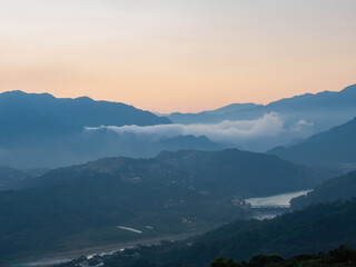 Fototapeta premium Sunrise view of some rural mountain of Xindian District