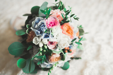 Wonderful luxury wedding bouquet of different flowers