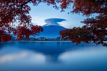 View of Lake Kawaguchi at sunrise with snow capped Mount Fuji in background, Japan.