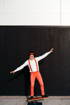 Circus performer on balance board