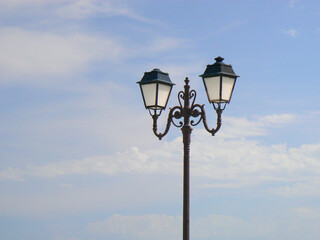 Fototapeta na wymiar Antique black wrought iron street light