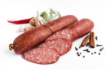 baked smoked sausage with lard on a white plate
