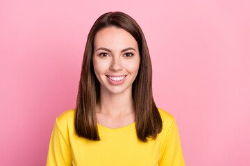 Fototapeta premium Photo of pretty brunette hair young lady wear yellow t-shirt isolated on pastel pink color background