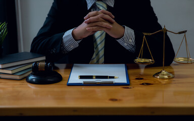 justice and law concept. Close-up Of male lawyer working in office. Legal law, advice and justice concept.	