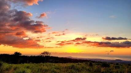 Fototapeta premium a red sunset, Sunset, a sunset scene, sunset scenery, Sunset in Jeju Island Korea