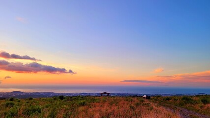 Naklejka na ściany i meble a red sunset, Sunset, a sunset scene, sunset scenery, Sunset in Jeju Island Korea
