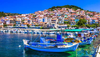 Fototapeta na wymiar Traditional colorful Greece - charming Plomari town. Fishing boats in the port, Lesvos island, Eastern Sporades