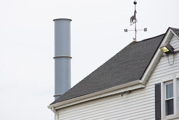 ventilation pipe near the house metal roof air