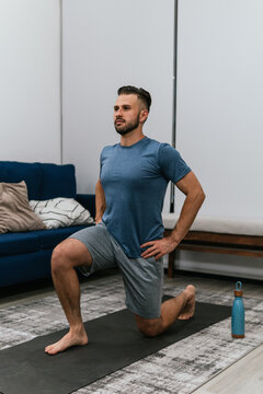 Sportswoman Doing Lunge Exercise During Workout At Home