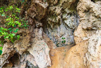 Beautiful nature landscape view background.  Mountain wall with some green plants. Greece. 