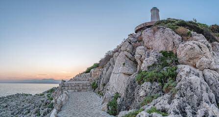 Fototapeta premium Coucher de soleil sur le phare du Cap Ferrat sur la Côte d'Azur 