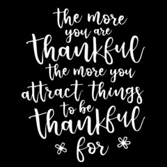 the more you are thankful the more you attract things to be thankful for on black background inspirational quotes,lettering design