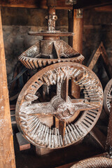 Transmission of rotation of the mill using metal gears - the mechanics of a medieval flour mill