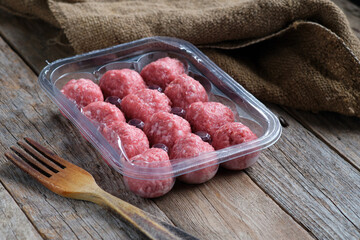 Raw meatballs made from ground beef