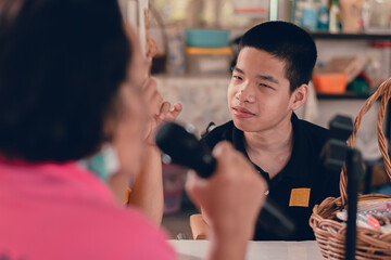 Smart disabled child smiling face with happy in school for special children, Art therapy classroom with disabled person, Mental health concept.
