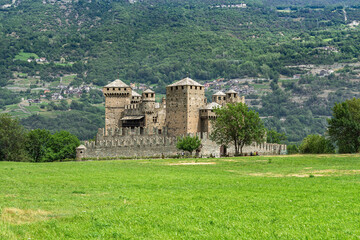 Fototapeta premium View of Fenis Castle, a famous medieval Castle in Aosta Valley and one of the major tourist attractions of the region