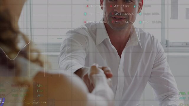 Stock market data processing against businessman and businesswoman shaking hands at office