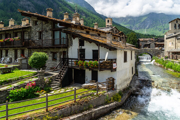 Fototapeta na wymiar View of Chianale, a typical alpine village in Piedmont region and one of the most beautiful villages in Italy