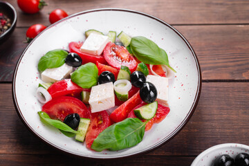 Greek salad feta, olives, vegetables, tomato no meat food organic product meal snack on the table copy space food background rustic. top view keto or paleo diet veggie vegan or vegetarian food