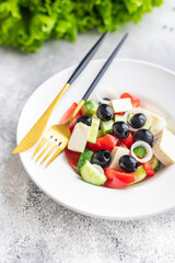 Greek salad feta, olives, vegetables, tomato no meat food organic product meal snack on the table copy space food background rustic. top view keto or paleo diet veggie vegan or vegetarian food