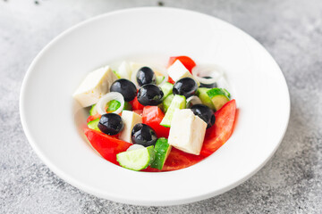 Greek salad feta, olives, vegetables, tomato no meat food organic product meal snack on the table copy space food background rustic. top view keto or paleo diet veggie vegan or vegetarian food