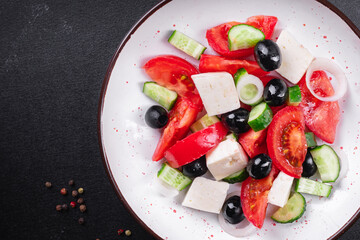 Greek salad feta, olives, vegetables, tomato no meat food organic product meal snack on the table copy space food background rustic. top view keto or paleo diet veggie vegan or vegetarian food