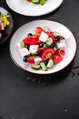 Greek salad feta, olives, vegetables, tomato no meat food organic product meal snack on the table copy space food background rustic. top view keto or paleo diet veggie vegan or vegetarian food