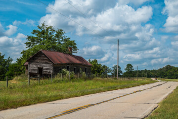 Rural backroad through farmland