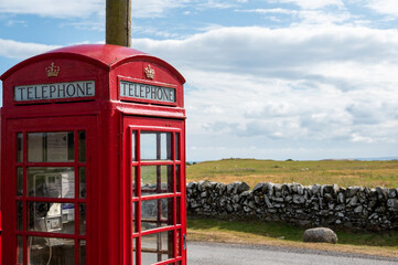 Red phone box at the coast