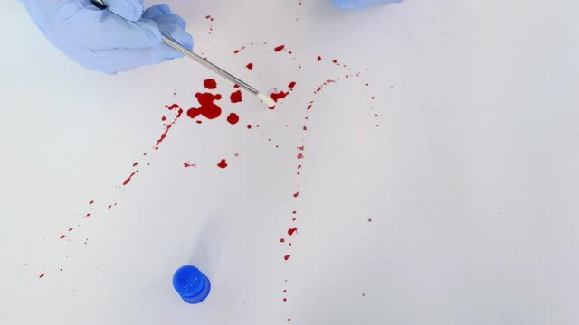 evidence idfresh splatter of red blood on white table, sharp knife stained at crime scene, forensic expert examines surfaces, collects evidence, forensic medical examiner work concept