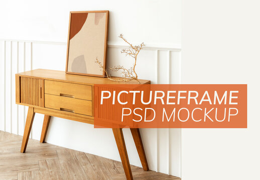 Picture Frame Mockup on a Wooden Sideboard Table