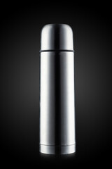 Metal thermos on black background with clipping path