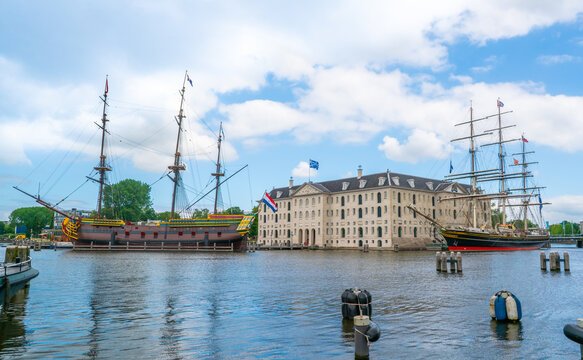 Amsterdam, The Netherlands 23th June 2021 -The Scheepvaarrtsmuseum (The National Maritime Museum) with 2 sailing boats in the center of Amsterdam
