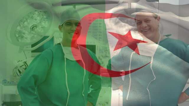 Digital composition of algeria flag waving against diverse male surgeons smiling at hospital