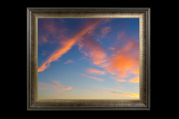 wood frame with a carved pattern for a picture of the sky on a black background