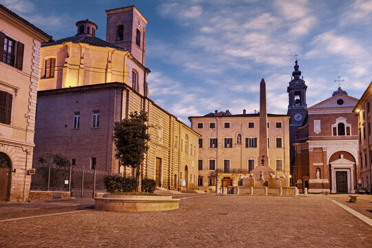 Jesi, Ancona, Marche, Italy: the medieval square Federico II with the obelisk, the cathedral and the ancient buildings