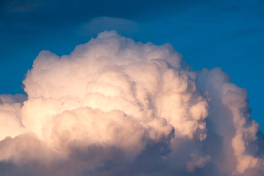 Thunderhead building in the late afternoon sky.