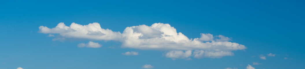 Naklejka na ściany i meble Panoramic white clouds in blue sky